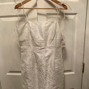 Short, white eye-let dresss